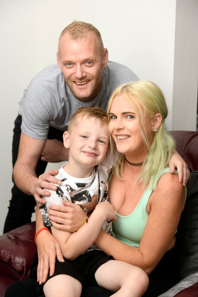 Jacob Jones who was helped by the terminally ill Rhys Langford who died of cancer earlier this year, with his parents Emma Williams and Alwyn Jones