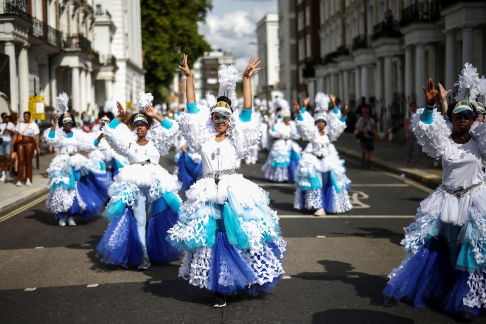 Colourful partygoers took part in parades today