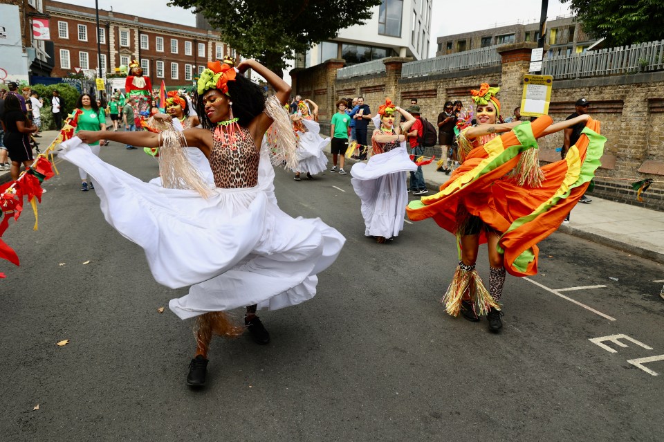 Colourful partygoers took part in parades this morning