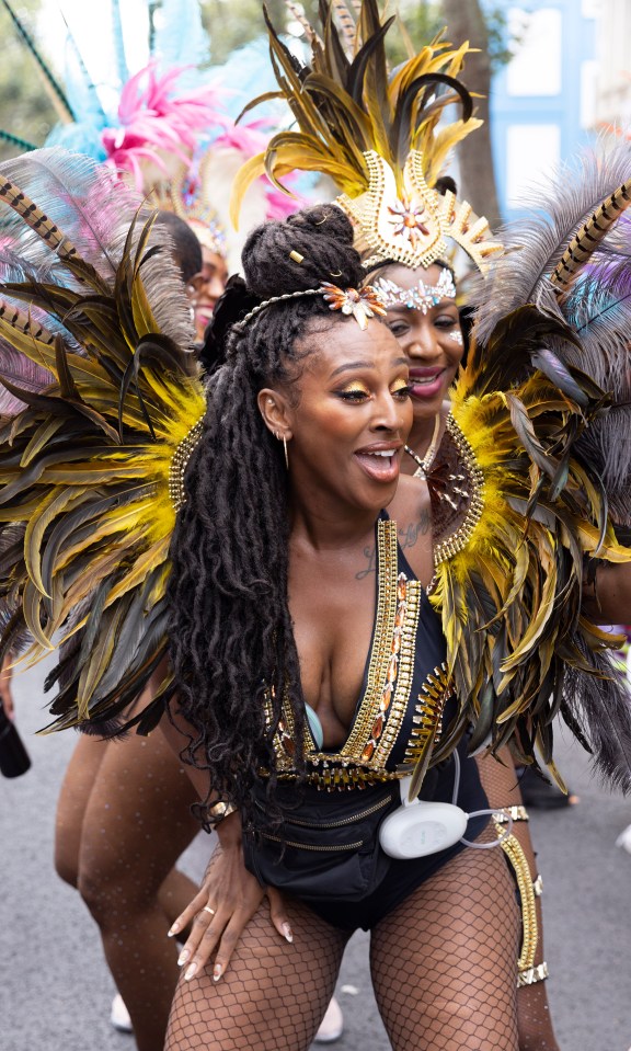 Alexandra Burke appeared alongside The Utopia Band wearing an Elvie Stride breast pump under her costume at Notting Hill Carnival as part of the ‘Pumps on Parade’ campaign