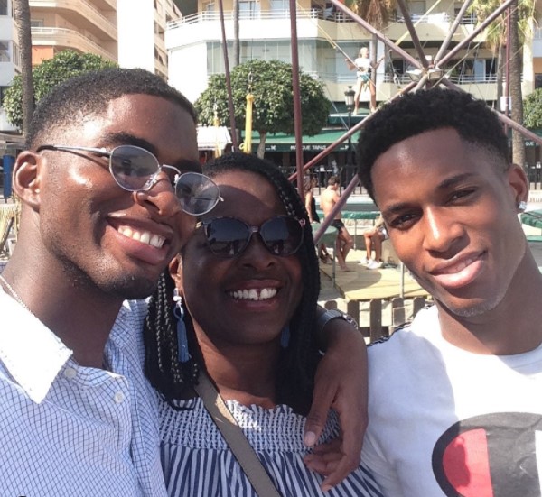 Remi (right) with his mum and brother Jordan (left)