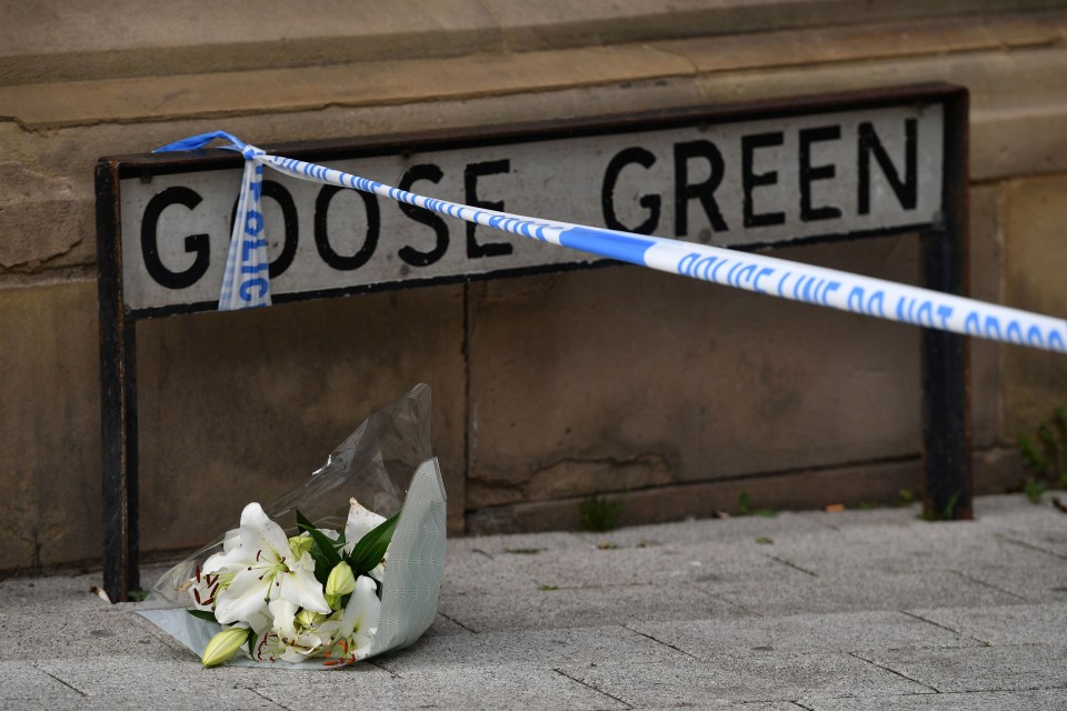 Flowers at the scene in Railway Street