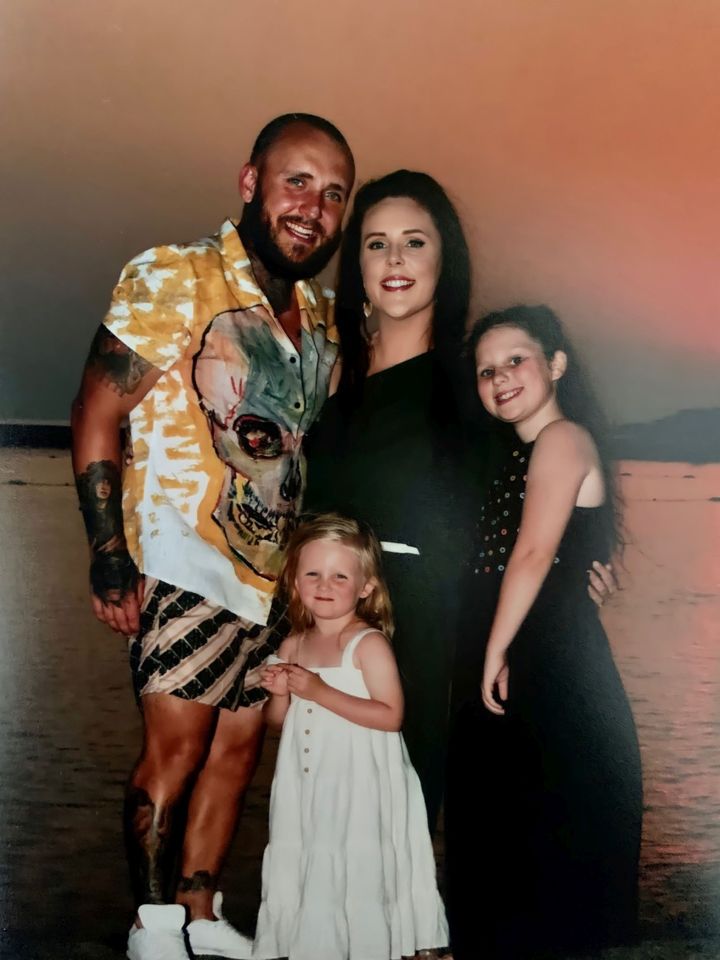 Alisha on holiday with partner Arron Evans and daughters Amora and Aryella