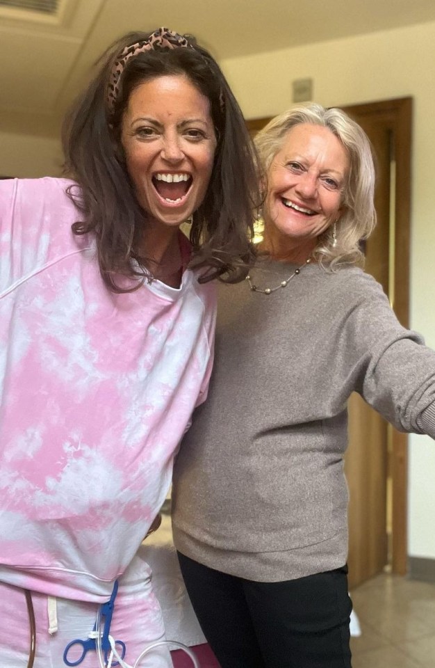 Debs with her mum as she had chemo in hospital