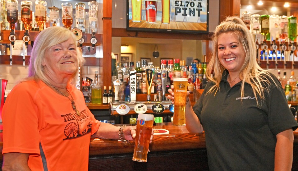 Lynn’s daughter Michaela pulls pints alongside her mum