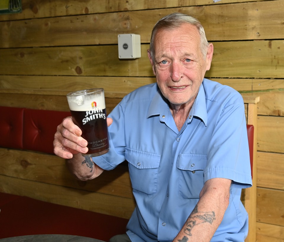 Punter Michael Cain enjoys a pint at the pub