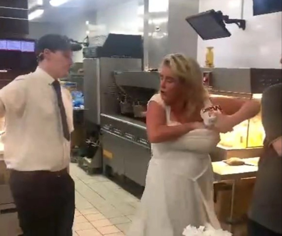 A fuming woman got behind a McDonald’s counter before stuffing burgers down her bra