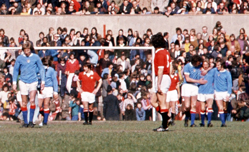 Denis Law, second right, scored a back heel which confirmed United's relegation