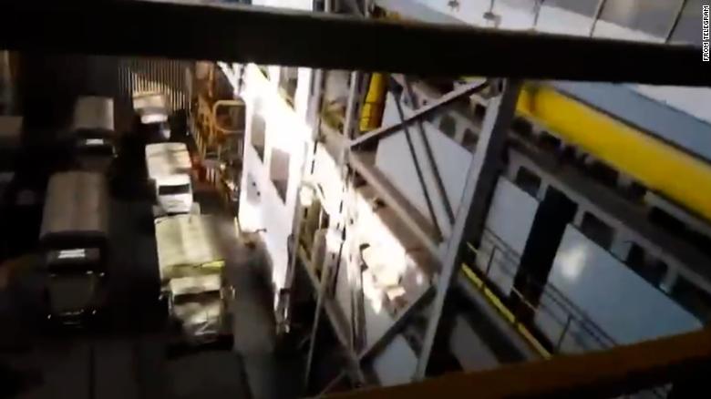 Footage shows Russian trucks inside the plant