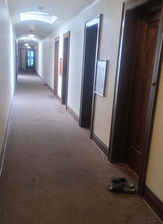 A woman questioned whether or not her neighbour was "brilliant or trashy" for running an extension cord from his apartment to the plug in the building hallway