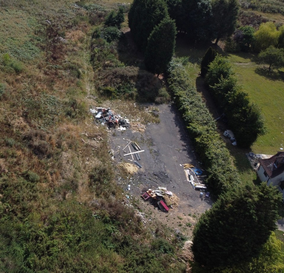 Fly-tipped rubbish has been discarded in the grounds of the £1.4m property