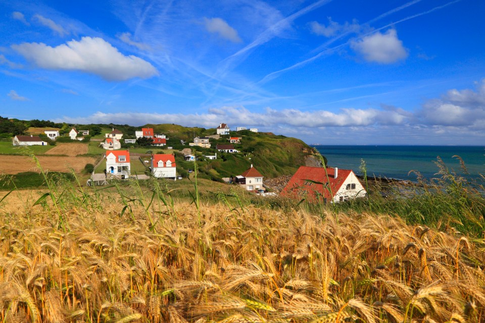 Colourful seaside houses on France's north coast give you a different perspective of the channel