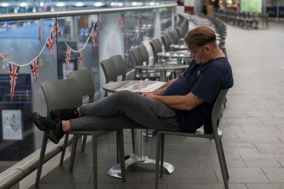 Commuters snoozed as they waited to travel