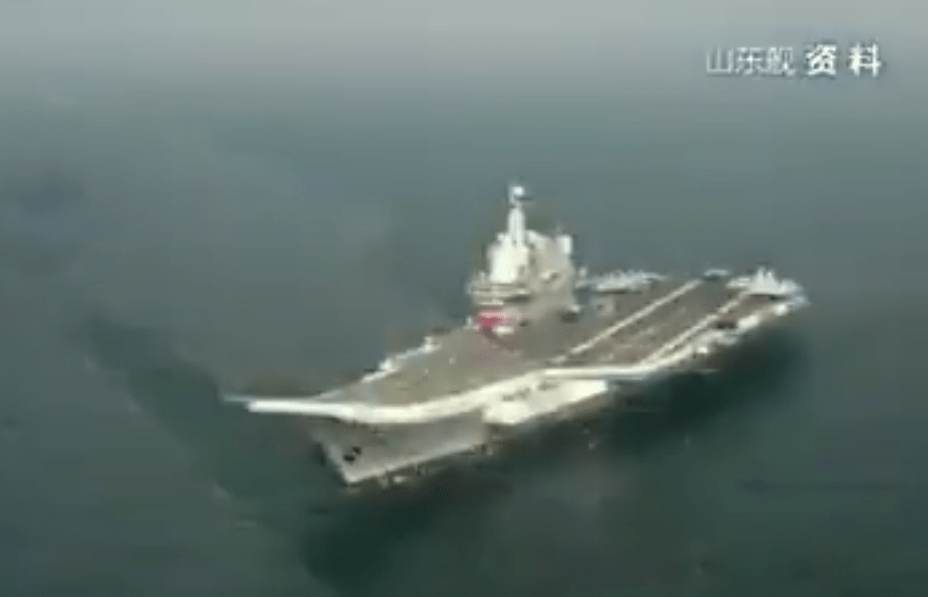 Footage released by China showing one of its aircraft carriers at sea