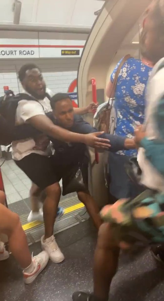 The underground clash is said to have started when one of the thugs began staring at the passenger