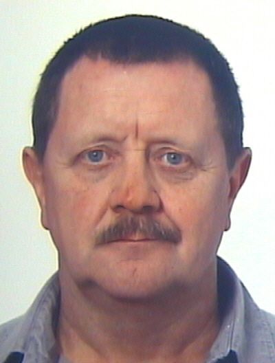 Robert Timmins is wanted by Interpol for allegedly killing his neighbour in 2011