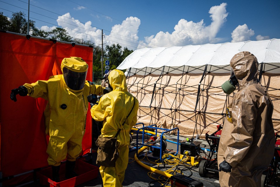 Ukrainian Emergency Ministry rescuers attend the exercise in the city of Zaporizhzhia