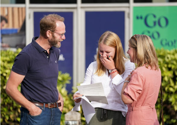 Pupil Millie Clark reacts to her A-Level results