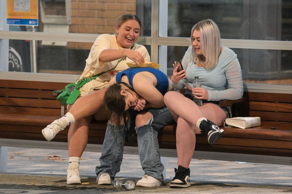 One group of friends joked around by resting a food box on their mate’s back