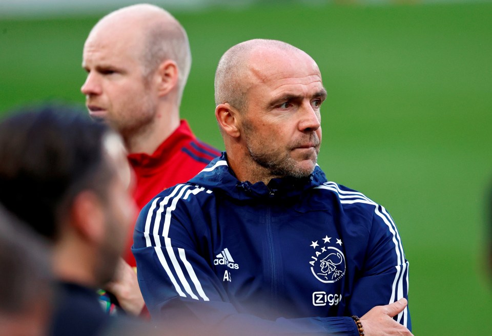 Ajax manager Alfred Schreuder oversees his squad as they train at Anfield