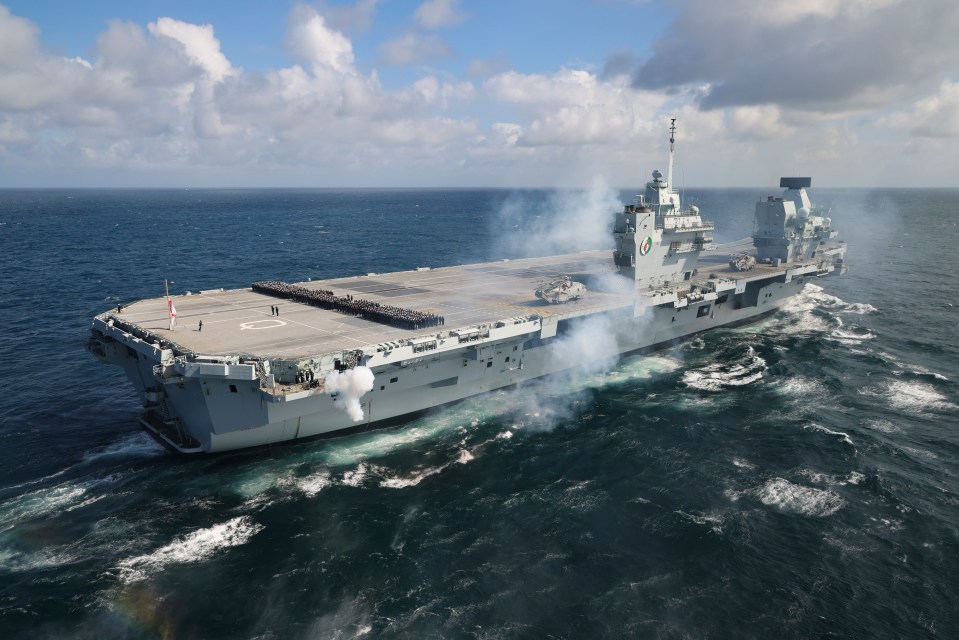 At sea the Royal Navy’s flagship HMS Queen Elizabeth led the salute from UK waters