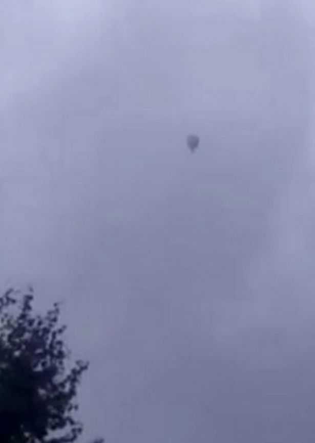 Hu's pal managed to jump to safety before the balloon floated away