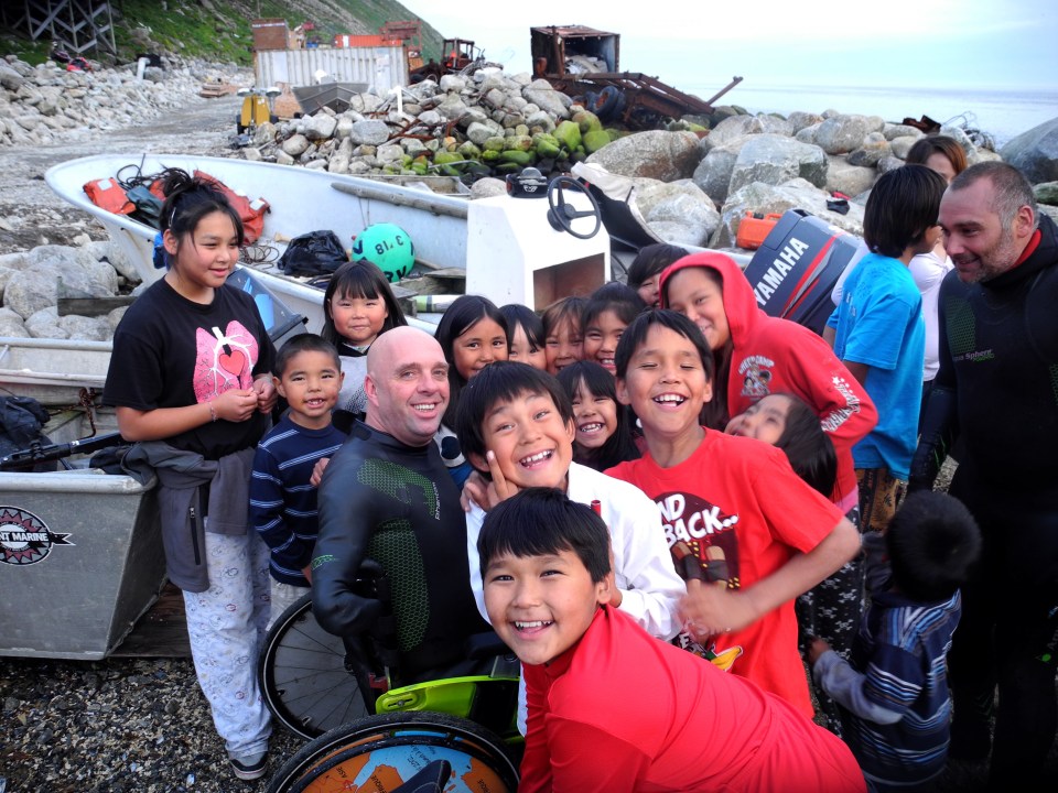 French swimmer Philippe Croizon meets the native population of Little Diomede