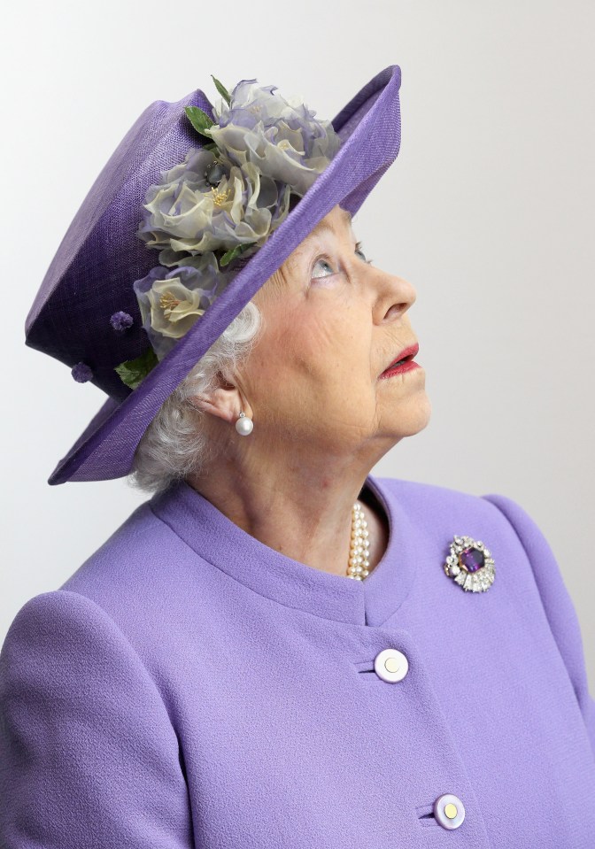 This flowery hat worn in Stevenage, Herts in 2012 was a classic look from her golden final years