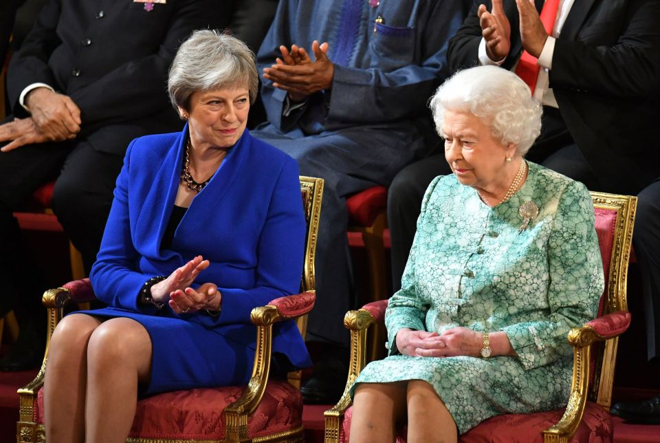 Theresa May with the Queen