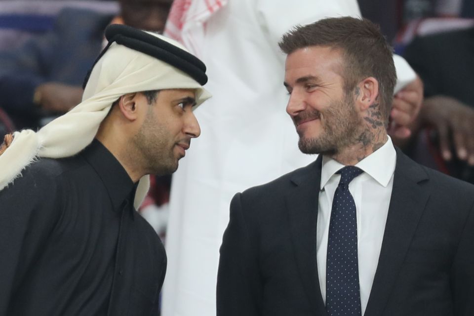 England legend David Beckham speaks with Nasser al-Khelaifi, chairman of Qatar Sports Investments