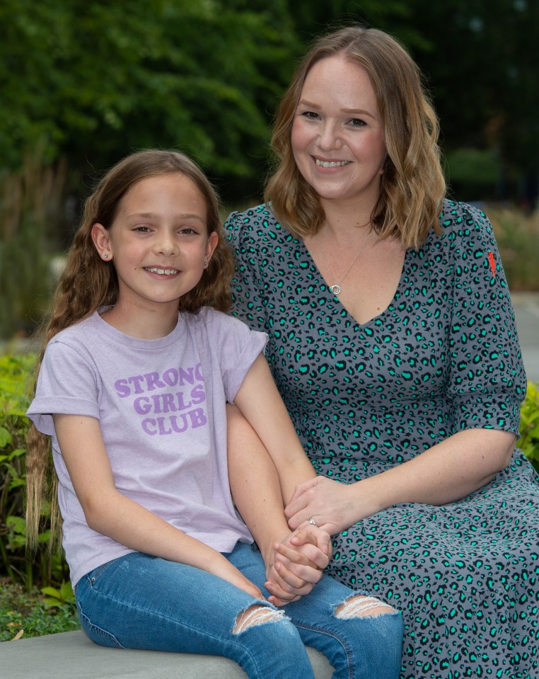 Amelie Fielding with her mum Amy outside The Christie in Manchester where Amelie was diagnosed late last year with a chordoma, a rare type of cancer