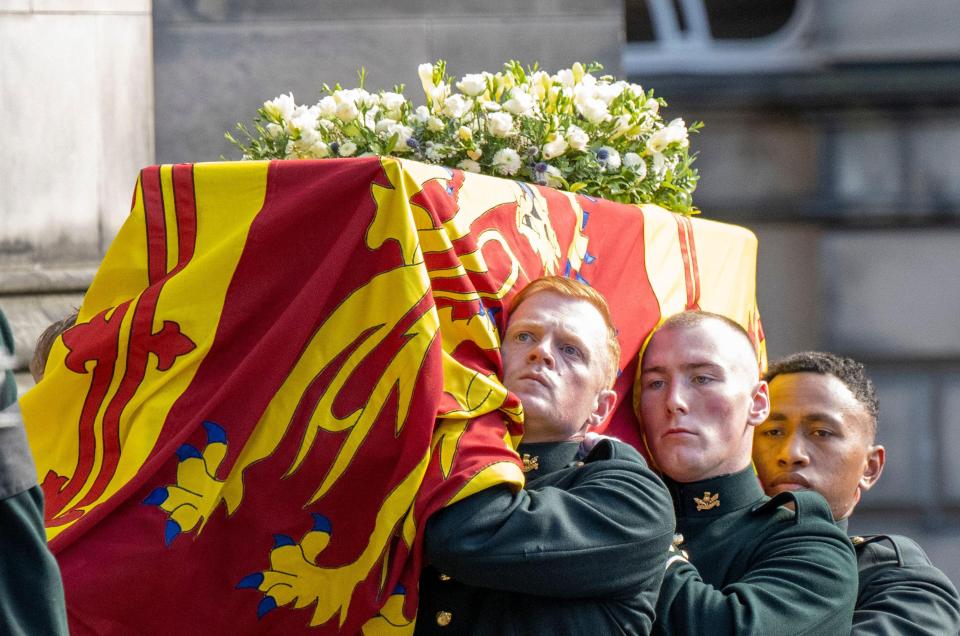 The coffin of Queen Elizabeth ll, draped with the Royal Standard of Scotland