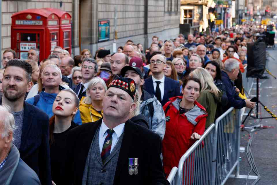 Members of the public queue outside St Giles’ Cathedral to pay their respects