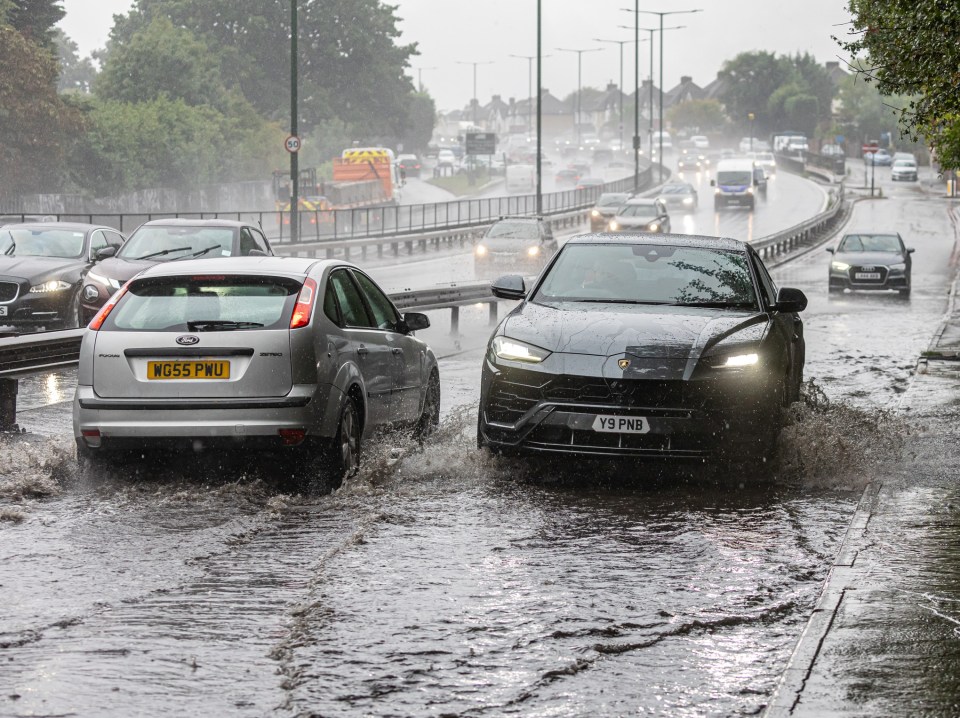 Flooding pictured on the Malden Way slip road in south-west London last week