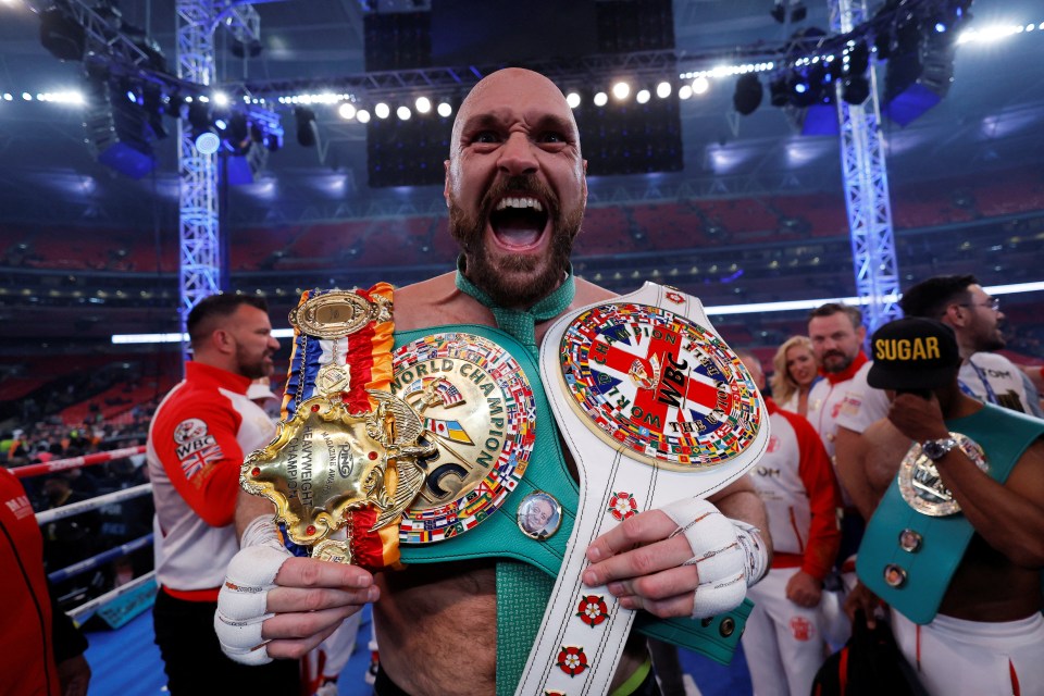 Fury celebrates retaining the WBC belt after beating Dillian Whyte in April