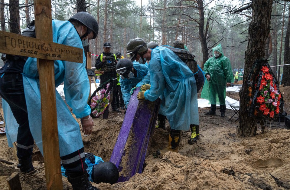 Teams have been working in the wood exhuming bodies