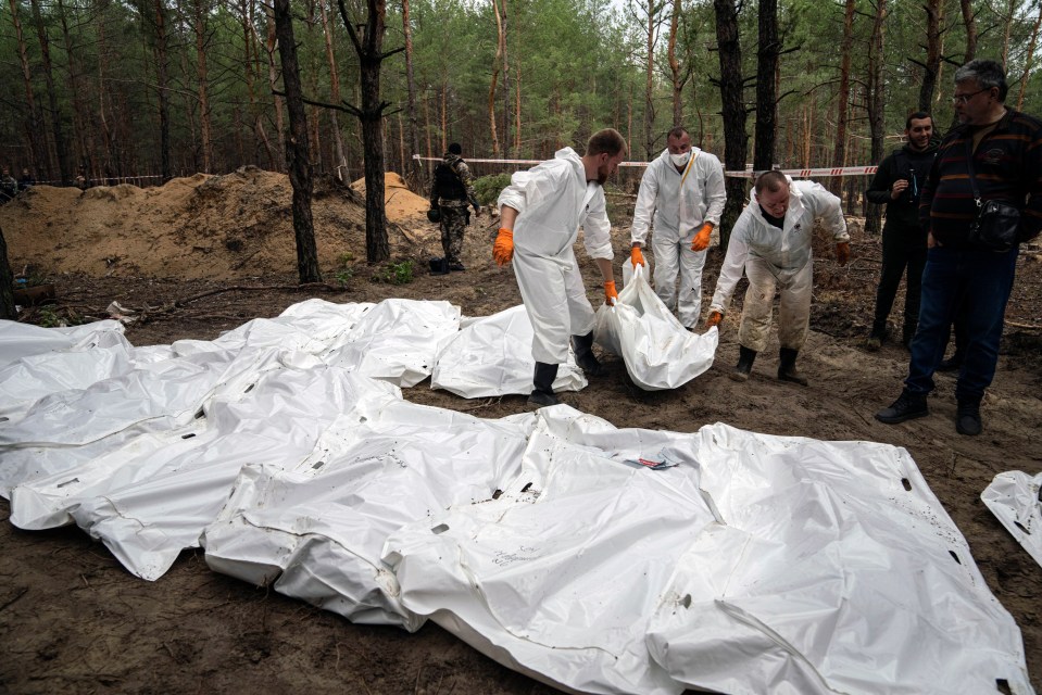 Around 450 bodies have been found at the grave