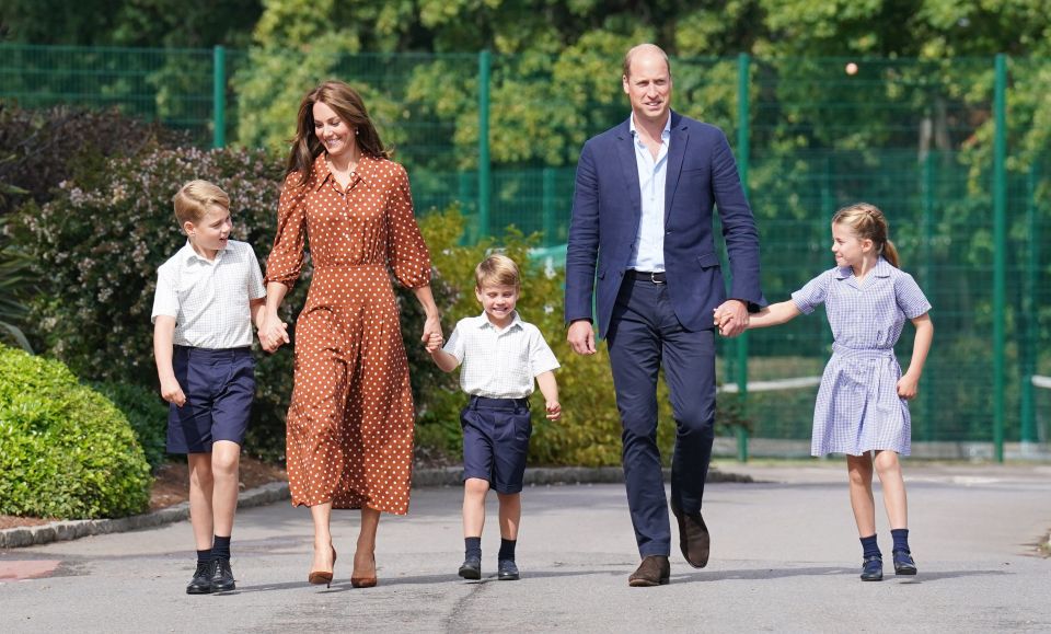 Young royals George, Charlotte and Louis arrive together at their new school yesterday for the first time