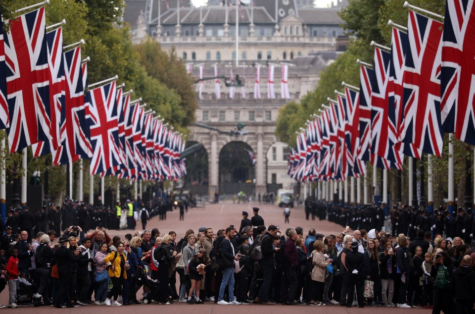 Queues of people form along The Mall ahead of the state funeral