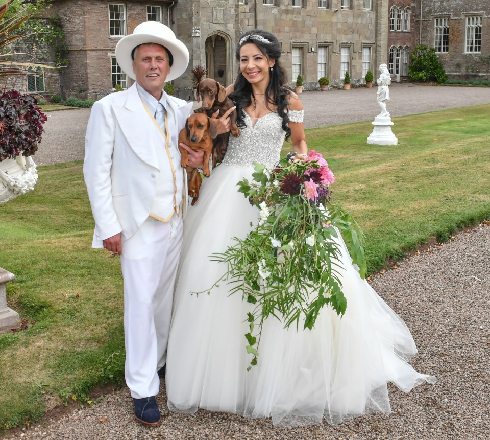 Bez and his bride Frou posing with their pet dogs