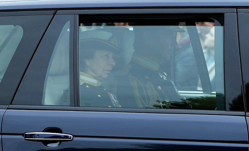 Anne, Princess Royal and Vice Admiral Sir Timothy Laurence arrive by car