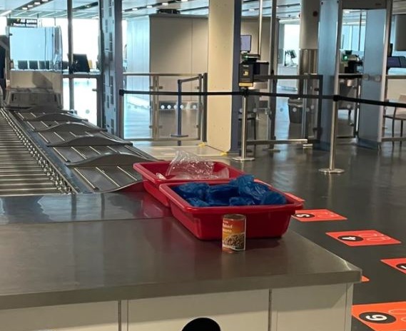 A passenger at Manchester Airport was left very baffled by the tin of beans at security