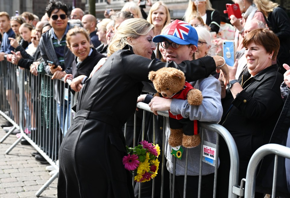 Sophie hugged the young boy in a touching moment