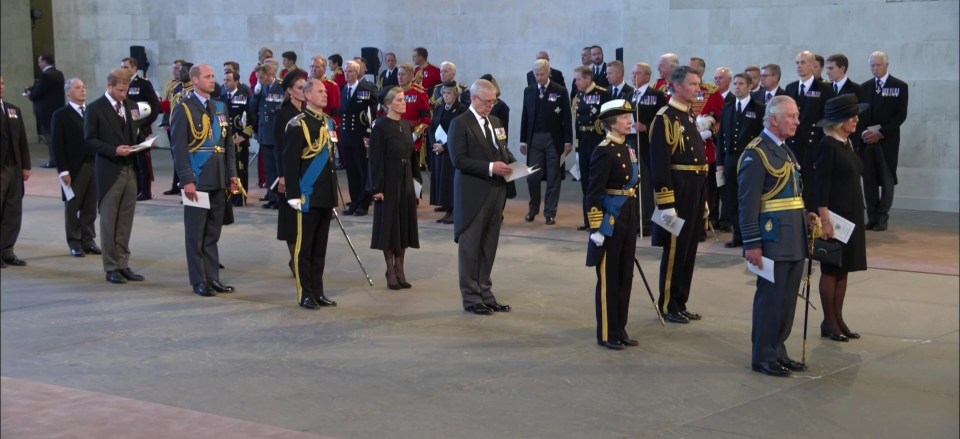 The royals wait as Her Majesty is placed on the catafalque in Westminster Hall