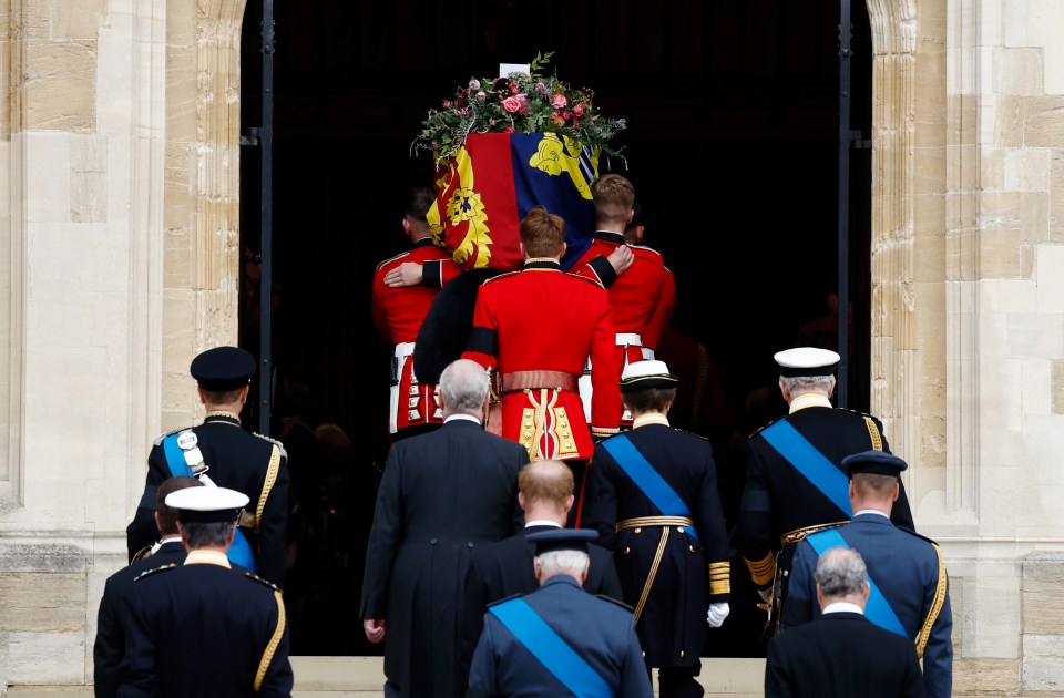 Pall bearers carry the coffin of Queen Elizabeth II into St George’s Chapel on in Windsor