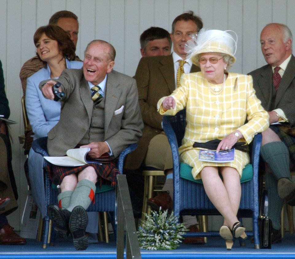 The Queen pictured attending the Games with the late Prince Philip in 2003