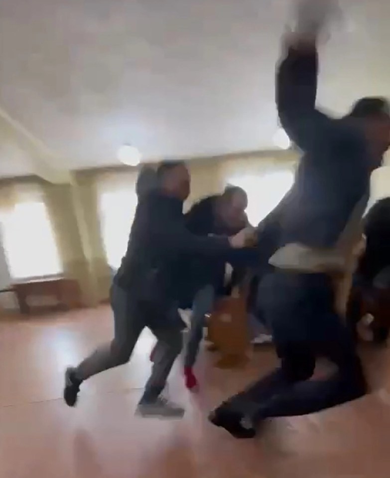 Shocking footage of the incident shows a dozen men fleeing for their lives