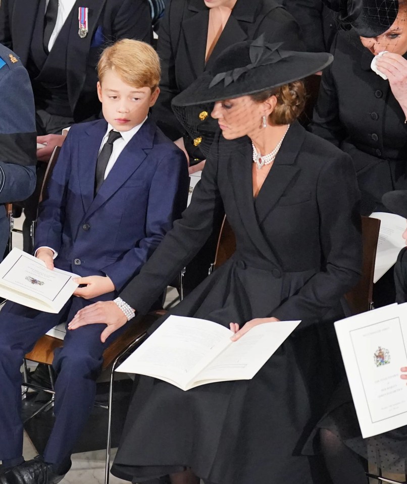 The Princess of Wales comforts George during service at Westminster Abbey