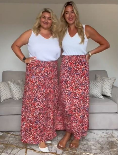 It wasn't just dresses - they also tried on this red patterned skirt with a white vest top