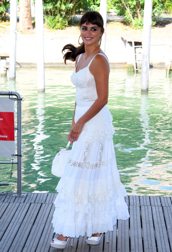 Penelope Cruz dazzled at the Venice Film Festival in this ankle-length white dress and heels